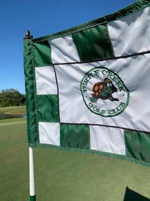 Pin flag with Turtle Creek logo.