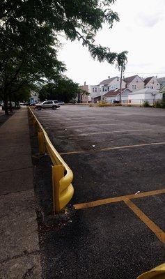 Parking lot for Immaculate Conception Church - north side of 44th St. between Fairfield and California Avenues