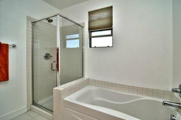 TUB AND SHOWER AT THE BREA LOFTS