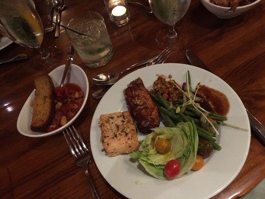 Buffet dinner for a private dinner.  Ribeye, salmon, BBQ bourbon chicken, wedge salad, green beans. Turkey chili and amazing cornbread