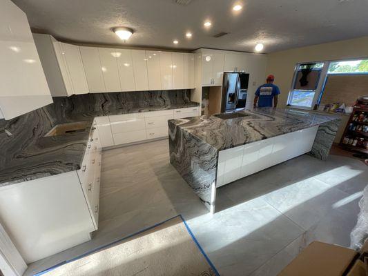 Blue Horizon Kitchen with waterfall edge and full height backsplash