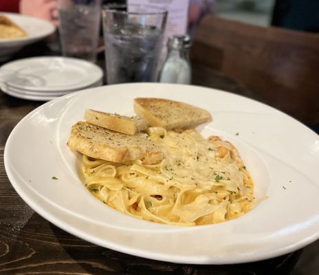 CREOLE SEAFOOD PASTA  Shrimp and crawfish tails sauteed in a spicy cream sauce over fresh-made pasta, served with garlic sourdough toast.