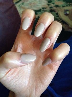 Almond shaped nails with nude polish