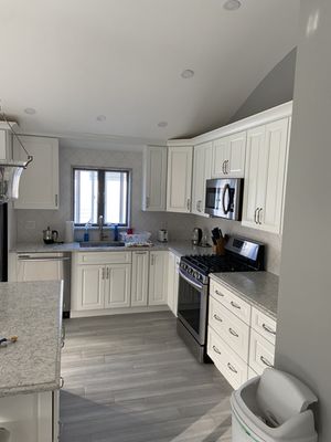 Kitchen Reno  Beautiful wood look tile throughout my whole open concept kitchen/ living room/ dining room