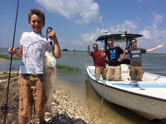 Happy Boy With Redfish