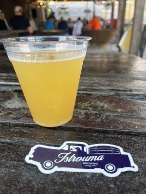 A hazy ipa and brewery sticker