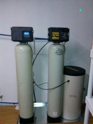 Water treatment system to remove iron, sulphur,  and hardness.