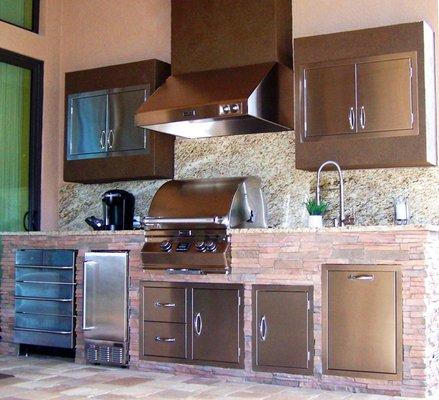 Stone covered outdoor kitchen