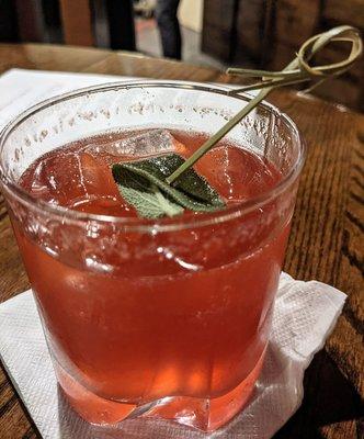 Jeanette Rankin's Shrub, a few sips in (gin, house made pear & blackberry shrub, tonic water, maple bitters, fresh sage)