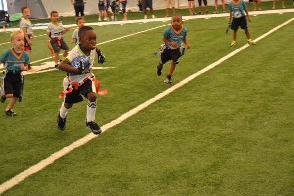 NFL Flag football inside the Miami Dolphin "bubble" at the Nova Training facility.