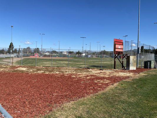 Ball field with scoreboard.