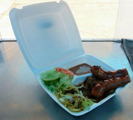 Plate Lunch. Carne asada and sausage with salad, beans and rice.