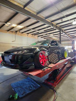 Nissan S15 Silvia getting a Drift spec alignment.