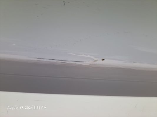 Inside of the window that was caulked by Chris