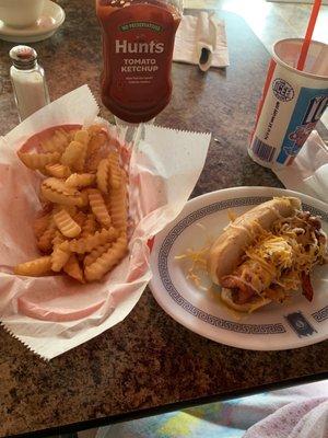 Bacon hotdog with cheese and fries