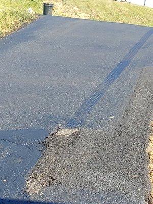 Asphalt patch falling apart after we drive on it for the first time several days after install