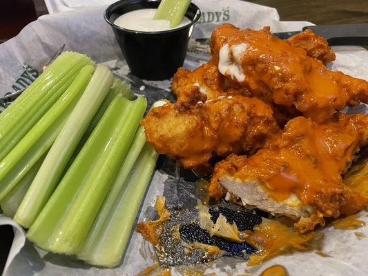 Chicken Tenders tossed in buffalo sauce with Celery & ranch