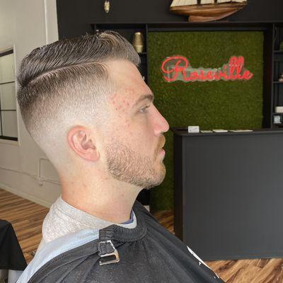 Mid skin fade by Joel