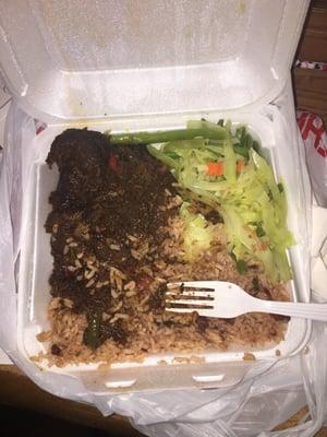 Steak, rice and beans, and cabbage.