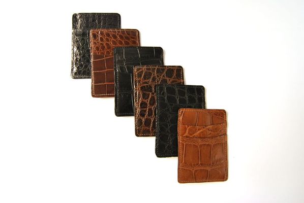 Vertical Card Case with Alligator exterior and leather interior. 5 slots (4" x 2 3/4")