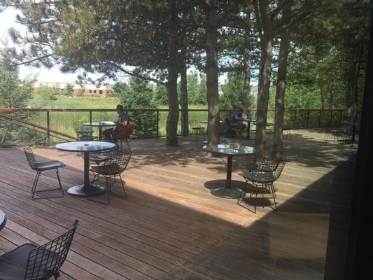 Awesome outdoor patio w trees for shade.