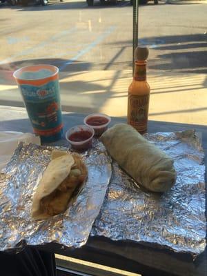 Grilled chicken burrito and a fish taco.