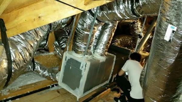 My youngest 19 yr old son helping in the attic replacing furnace,  coil and plenum.