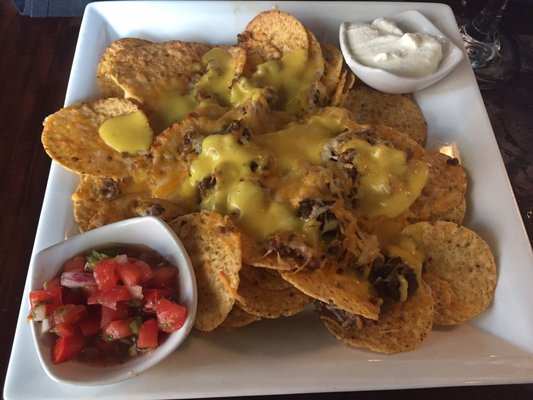 Very very SAD nachos. Barely anything on them... $9