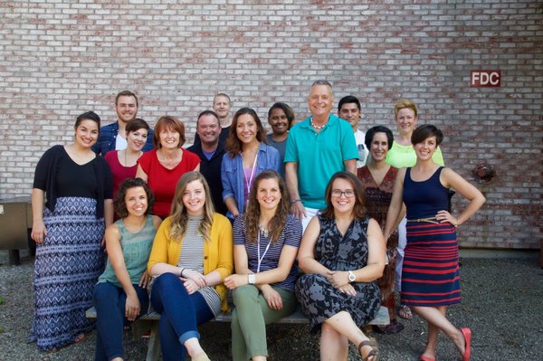 The Spectrum Team poses for a group photo in celebration of the third anniversary of our opening.