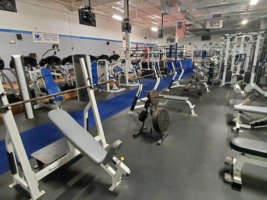 Gym View - Cardio Area and Boxing Ring in Background