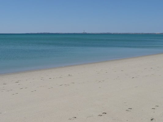 Relax and enjoy a private association beach on Cape Cod Bay with views of Provincetown and the Provincetown Monument.