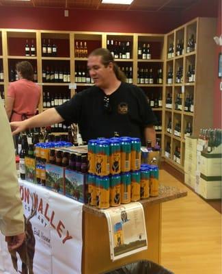 Ryan from Anderson Valley Brewing pouring a hEElch 'O balanced beer