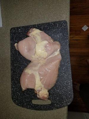 This is the chicken you actually get from Munsee Meats.  Not split.  Not trimmed.  It was sitting in a bag of slime, so it wasn't clean.