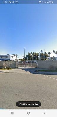 The only entrance and exit for where they keep their vehicles. This gate is located right acros the blue 'Fix It' building.