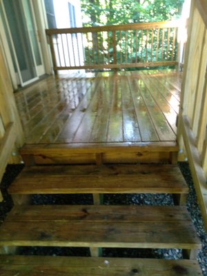 Treated and power washed rails. Look at that difference.