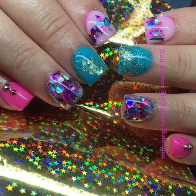 Tiffanie, the owner of this shop is AMAZING!! This is a new set of nails i got done by her! Love how she does her own mixes of glitter!