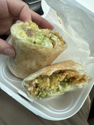 Avocado burrito with chicken.