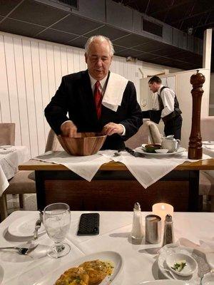 Donnie Webb prepares Caesar Salads tableside