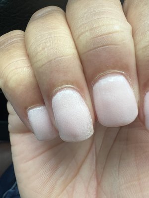 Inconsistent nails. Bumpy, uneven.