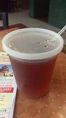 Home made ice tea served in a quart soup container! :-)