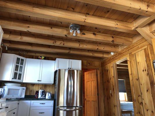 two coats of water born polyurethane on beams and ceiling