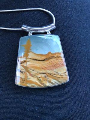 Pendant of Picturestone in silver bezel made by Jim Chow. This is a single stone not a mosaic.