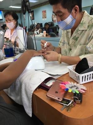 Friend getting her nails done