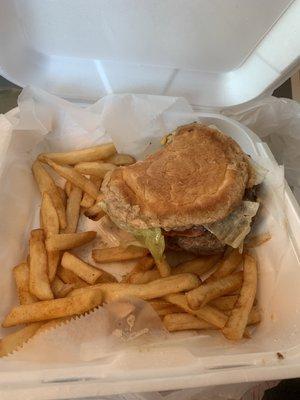 Double cheeseburger with fries.