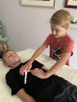 Children learning Reiki