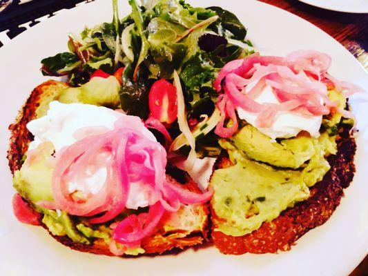 Avocado toasts with eggs and salad from the week end brunch menu