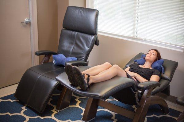 Patient relaxing in the pre-adjustment resting suite