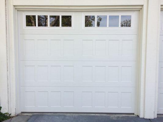 Amarr Oak Summit...recessed panel with Thames windows.