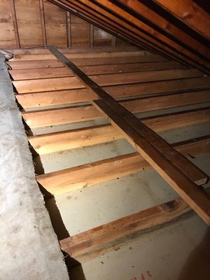 An after picture of an attic cleaning process. No more old insulation, animal remains, odors and years of clutter.