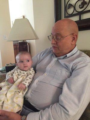 Bill Wolske CPA reading to granddaughter